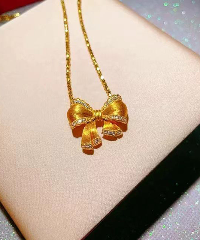 Elegant Gold Bow Zircon Pendant Necklace