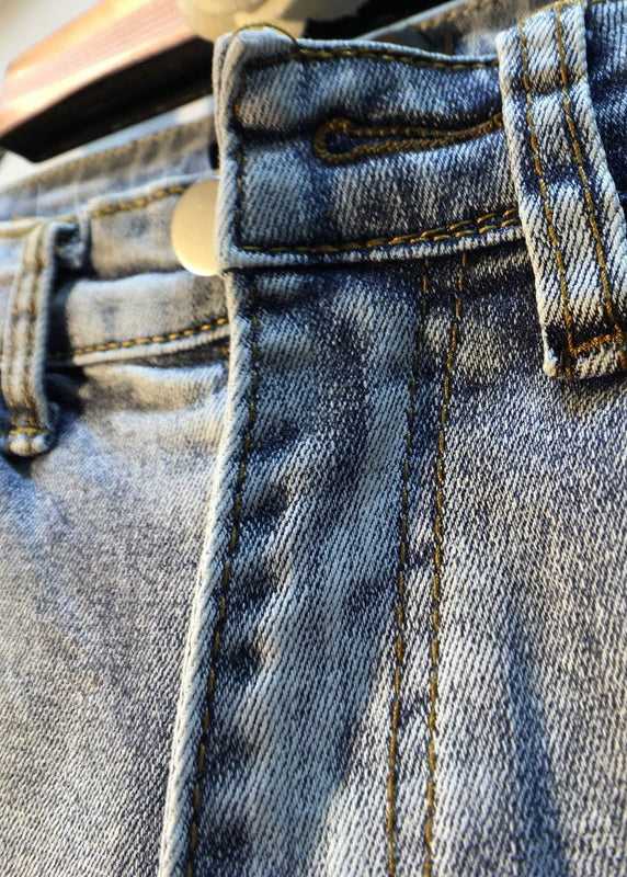 Moderne Denim-Shorts aus blauer Baumwolle mit Diamanten und Quaste